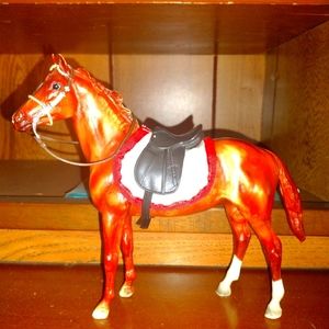 Breyer horse with tack.